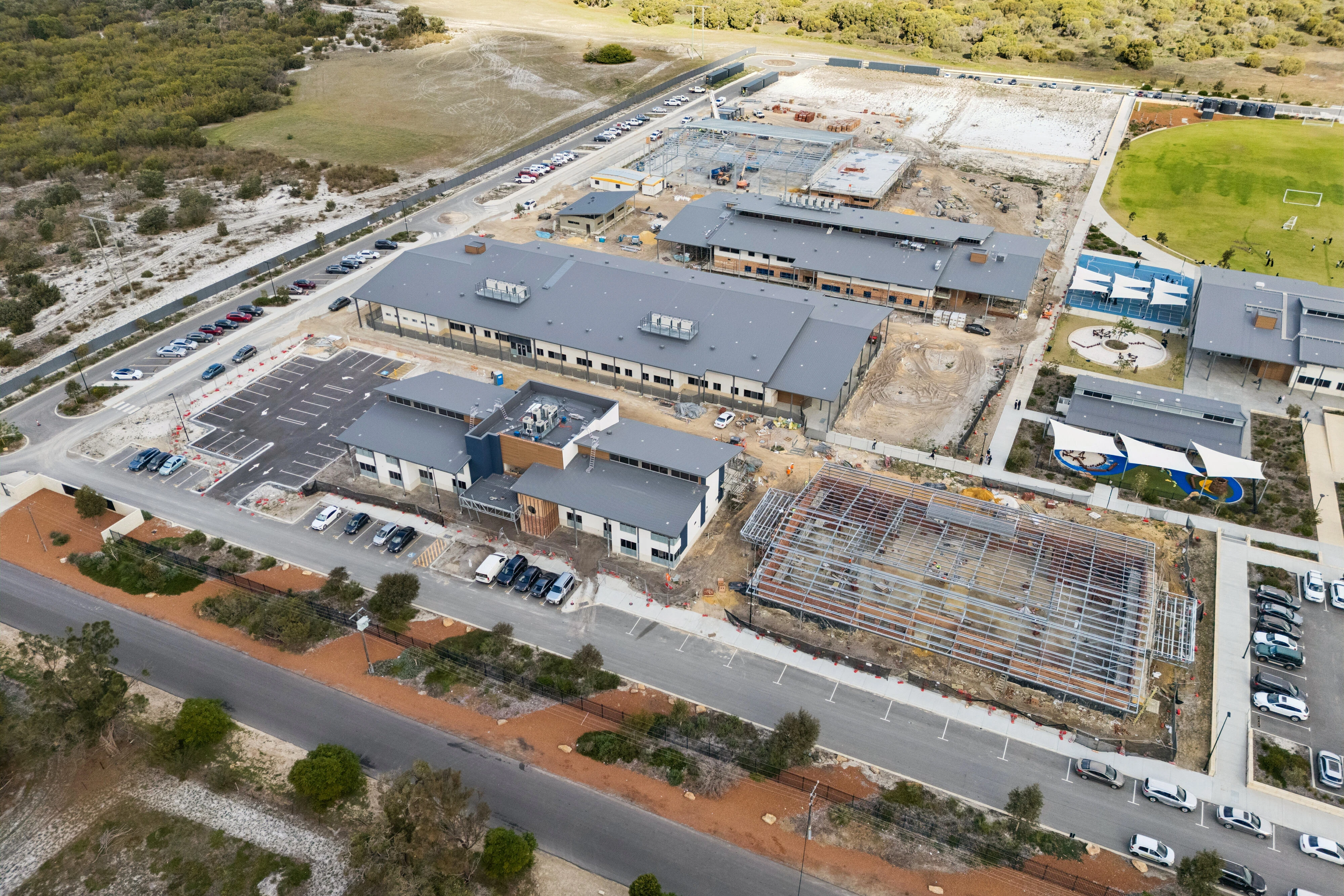 Captured in June, this footage shows the new gym and library on Stage 3 taking shape, with structural steel now in place and roofing works scheduled to commence in the coming weeks. Across Stage 2, the new high school, admin, specialty building, and canteen are steadily progressing towards completion, with handover on track for the end of August.